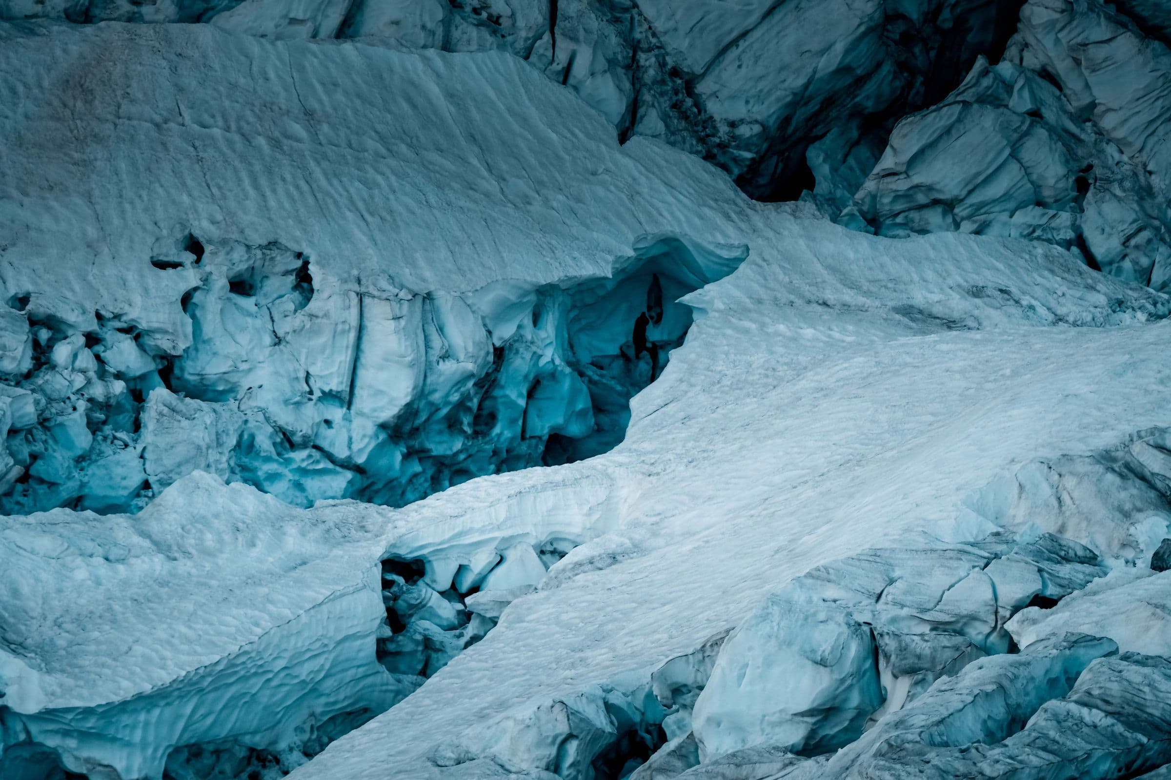 Stunning icy formations of glacier landscape in Haute-Savoie, France, showcasing nature's raw beauty.